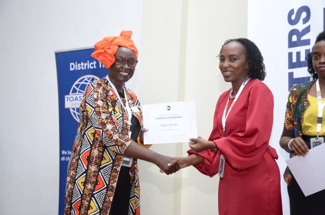 People watching a concert. Photo with a purple hue